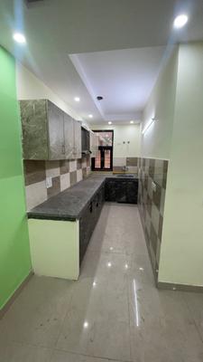 Kitchen Image of 675 Sq.ft 2 BHK Apartment / Flat for sale in ATFL JVTS Gardens, Chhattarpur New Delhi for Rs. 4800000