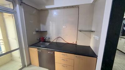 Kitchen Image of 900 Sq.ft 1 BHK Apartment / Flat for rent in Hiranandani Flora, Hiranandani Estate Thane for Rs. 33000