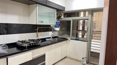 Kitchen Image of 1080 Sq.ft 2 BHK Apartment / Flat for rent in Adani The Meadows, Shantigram Ahmedabad for Rs. 35000