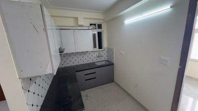 Kitchen Image of 900 Sq.ft 2 BHK Apartment / Flat for sale in MMD Harsh Residency, Sector 81 Noida for Rs. 4600000