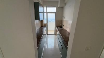 Kitchen Image of 1100 Sq.ft 2.5 BHK Apartment / Flat for sale in Mahagun Mahagunpuram, Mahagunpuram Ghaziabad for Rs. 7600000