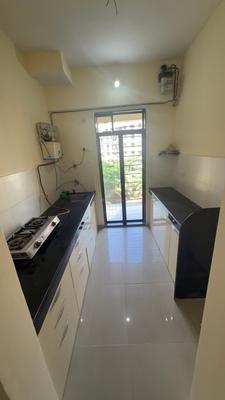 Kitchen Image of 1000 Sq.ft 2 BHK Apartment / Flat for rent in Squarefeet Grand Square, Kasarvadavali Thane for Rs. 25000