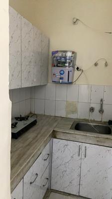 Kitchen Image of 450 Sq.ft 1 BHK Builder Floor for rent in Sector 56 Gurgaon for Rs. 26000
