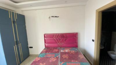 Bedroom Image of 990 Sq.ft 3 BHK Builder Floor for rent in Satbari New Delhi for Rs. 45000