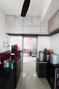 Kitchen Image of 1305 Sq.ft 3 BHK Independent House for sale in Aaditya Pimpan 101 Green Homes, Pipan Ahmedabad for Rs. 9950000
