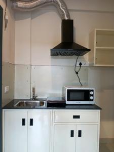 Kitchen Image of 530 Sq.ft 1 RK Apartment / Flat for rent in Sector 41 Gurgaon for Rs. 26000
