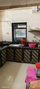 Kitchen Image of 875 Sq.ft 2 BHK Apartment / Flat for sale in Ulhasnagar Thane for Rs. 2600000