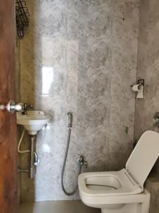 Common Bathroom Image of 630 Sq.ft 1 BHK Apartment / Flat for sale in Kasarvadavali Thane for Rs. 5700000