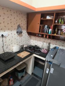 Kitchen Image of 600 Sq.ft 1 BHK Independent House for rent in Sanjaynagar Bengaluru for Rs. 16000