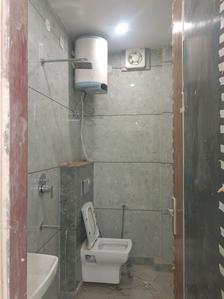 Common Bathroom Image of 680 Sq.ft 2 BHK Builder Floor for sale in Mahavir Enclave New Delhi for Rs. 7000000