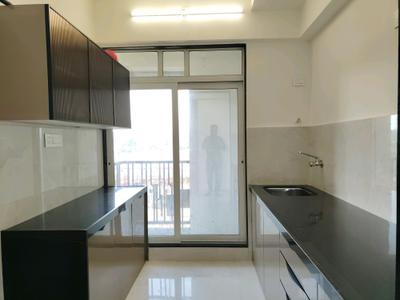 Kitchen Image of 999 Sq.ft 2 BHK Apartment / Flat for sale in Shripal Sattva Bldg 2, Vasai West Vasai for Rs. 5700000