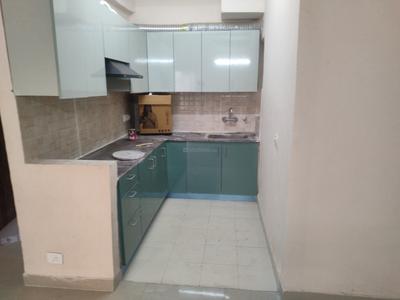 Kitchen Image of 920 Sq.ft 2 BHK Apartment / Flat for rent in Amrapali Dream Valley 2, Noida Extension Greater Noida for Rs. 20000