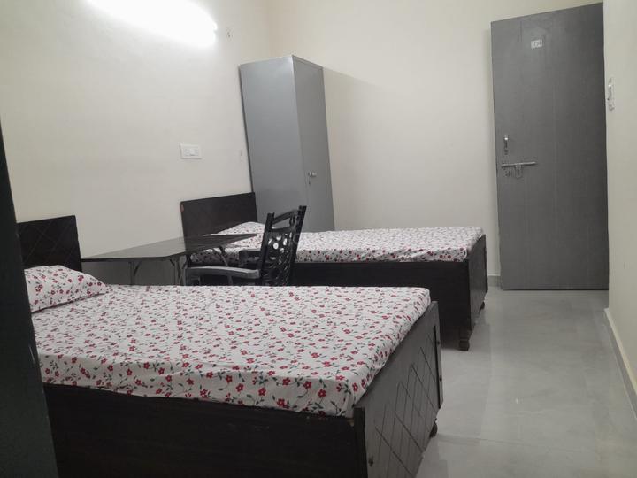 Bedroom Image of GLOBAL GIRLS PG jenpect in Sector 137, Noida