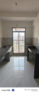 Kitchen Image of 655 Sq.ft 1 BHK Apartment / Flat for sale in Paradigm Pushpanjali Residency Phase III, Thane West Thane for Rs. 6490000