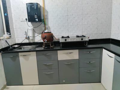 Kitchen Image of 1800 Sq.ft 3 BHK Independent House for sale in Ghanshyam Satya Crystal, Ambawadi Ahmedabad for Rs. 52500000
