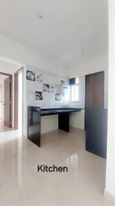 Kitchen Image of 950 Sq.ft 2 BHK Apartment / Flat for rent in Tirupati Eternia, Charholi Budruk Pune for Rs. 14000