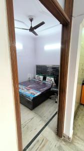 Bedroom Image of 900 Sq.ft 2 BHK Builder Floor for rent in Tagore Garden Extension New Delhi for Rs. 30000
