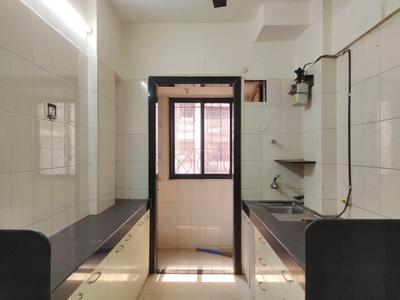 Kitchen Image of 575 Sq.ft 1 BHK Apartment / Flat for rent in Atul Blue Empire, Kandivali West Mumbai for Rs. 35000