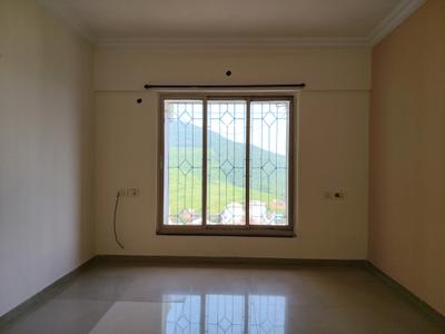 Living Room Image of 714 Sq.ft 2 BHK Apartment / Flat for rent in DGS Sheetal Tapovan, Malad East Mumbai for Rs. 50000
