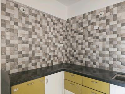 Kitchen Image of 550 Sq.ft 1 BHK Apartment / Flat for rent in Goel Hill Shire, Wagholi Pune for Rs. 14500
