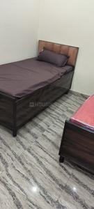 Bedroom Image of Shristhi PG in Sector 61, Noida