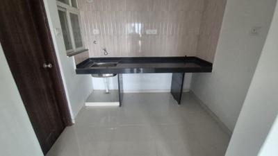 Kitchen Image of 560 Sq.ft 1 BHK Apartment / Flat for rent in Ganga Fernhill Phase I, Undri Pune for Rs. 13500