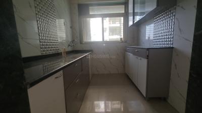 Kitchen Image of 960 Sq.ft 2 BHK Apartment / Flat for rent in Mohan Willows I, Badlapur East Badlapur for Rs. 14000