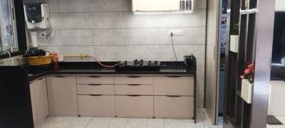 Kitchen Image of 1350 Sq.ft 2 BHK Apartment / Flat for sale in Dhanush Buildcon Canal Walk Shoppers Sanctum Celino, Vesu Surat for Rs. 5500000