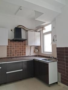 Kitchen Image of 950 Sq.ft 2 BHK Apartment / Flat for sale in Amrapali Zodiac, Sector 120 Noida for Rs. 8900000