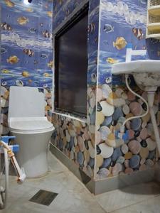 Common Bathroom Image of 300 Sq.ft 1 RK Independent House for rent in Sector 130 Noida for Rs. 10000
