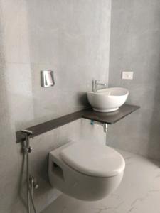 Common Bathroom Image of 1600 Sq.ft 3 BHK Apartment / Flat for sale in Yoo One Phase I, Mohammed Wadi Pune for Rs. 22500000