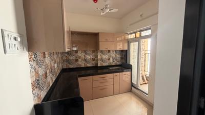 Kitchen Image of 608 Sq.ft 1 BHK Apartment / Flat for sale in Cosmos Enclave, Kasarvadavali Thane for Rs. 7200000