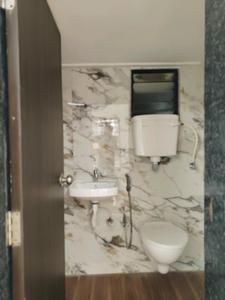 Common Bathroom Image of 695 Sq.ft 1 BHK Apartment / Flat for sale in Tata Shubh Griha, Boisar Mumbai for Rs. 2950000