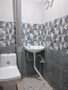 Common Bathroom Image of 1050 Sq.ft 2 BHK Apartment / Flat for sale in Sector 49 Noida for Rs. 4300000