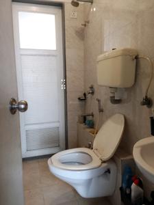 Common Bathroom One Image of 850 Sq.ft 1 BHK Apartment / Flat for sale in Dhanshree Dhana Shree Pearl, Taloja Navi Mumbai for Rs. 5300000