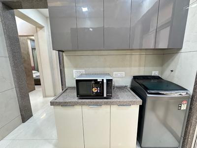 Kitchen Image of 1000 Sq.ft 2 BHK Apartment / Flat for sale in Mangeshi Dhara, Thakurli Thane for Rs. 7900000