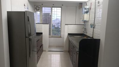 Kitchen Image of 1050 Sq.ft 2 BHK Apartment / Flat for rent in Wakadkar Pavilion 79, Hinjawadi Pune for Rs. 33000