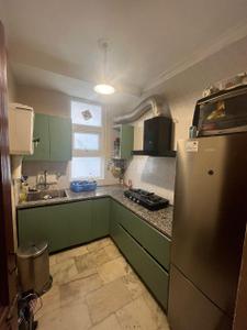 Kitchen Image of 800 Sq.ft 2 BHK Builder Floor for rent in Gulmohar Park New Delhi for Rs. 42000