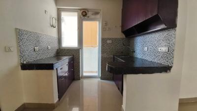 Kitchen Image of 1040 Sq.ft 2 BHK Apartment / Flat for rent in Sikka Kaamna Greens, Sector 143 Noida for Rs. 25000