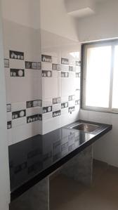Kitchen Image of 650 Sq.ft 1 BHK Apartment / Flat for sale in Mahape Navi Mumbai for Rs. 4300000