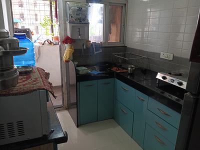 Kitchen Image of 650 Sq.ft 1 BHK Apartment / Flat for sale in Jhamtani Ace Aastha Building A, Charholi Budruk Pune for Rs. 3600000