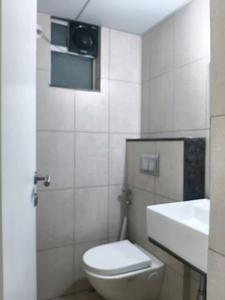 Common Bathroom Image of 654 Sq.ft 1 BHK Apartment / Flat for rent in Godrej Green Cove, Mahalunge Pune for Rs. 22000