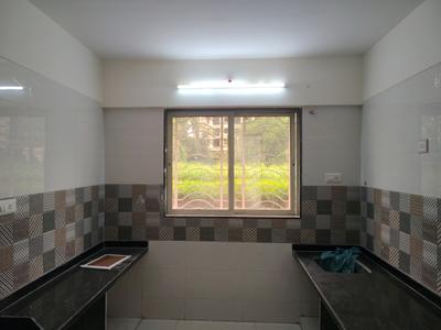 Kitchen Image of 530 Sq.ft 1 BHK Apartment / Flat for rent in Haware Dahlia Bldg A D And E, Kasarvadavali Thane for Rs. 15999