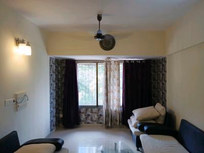 Living Room Image of 756 Sq.ft 1 BHK Apartment / Flat for rent in Nityanand Baug CHS, Chembur Mumbai for Rs. 45000