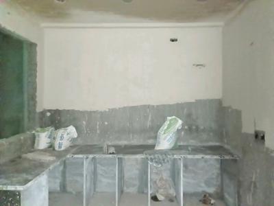 Kitchen Image of 950 Sq.ft 3 BHK Apartment / Flat for sale in Fairdeal Affordable Homes, Burari New Delhi for Rs. 4850000
