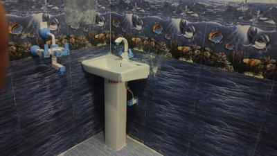 Bathroom Image of 650 Sq.ft 1 BHK Apartment / Flat for sale in Shalimar Garden Ghaziabad for Rs. 2750000