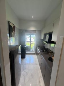 Kitchen Image of 600 Sq.ft 1 BHK Apartment / Flat for sale in Codename Upvan, Kharghar Navi Mumbai for Rs. 5000000