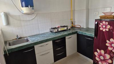 Kitchen Image of 650 Sq.ft 1 BHK Apartment / Flat for rent in Adani Aangan, Shantigram Ahmedabad for Rs. 23200