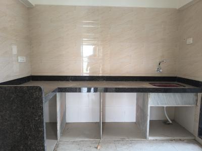 Kitchen Image of 900 Sq.ft 2 BHK Apartment / Flat for sale in Bhagwati Belmont, Kasarvadavali Thane for Rs. 9500000