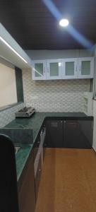 Kitchen Image of 675 Sq.ft 1.5 BHK Apartment / Flat for sale in Aaryan Mayuri Enclave, Wagholi Pune for Rs. 4500000